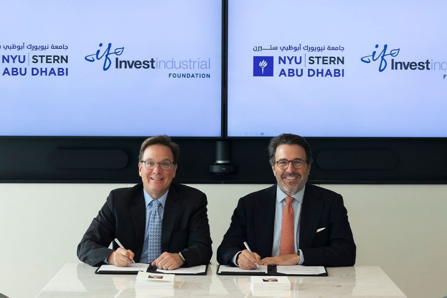 Robert Salomon, Dean of Stern at NYUAD, shown signing the Investindustrial Scholarship agreement